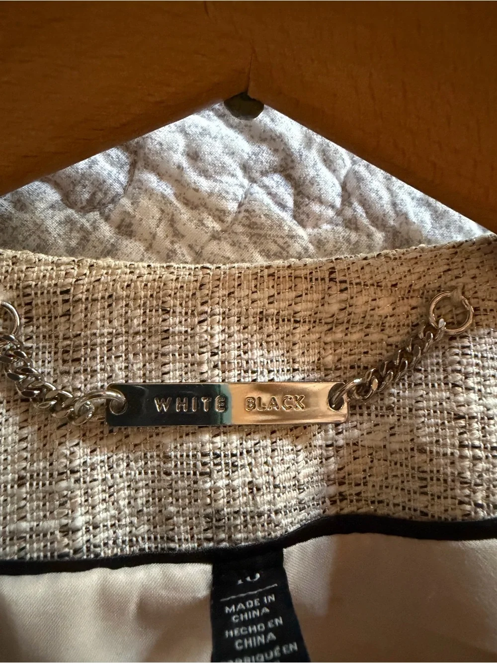 White House Black Market Cream Tweed Jacket with Black Trim Piping. Size 10.
